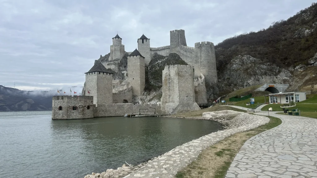 Golubac Fortress rising above the Danube River in Serbia with medieval stone towers along the water’s edge